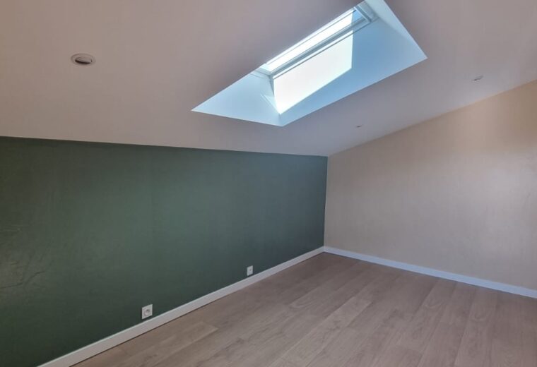 Amenagement de combles realise par Charpentier des Cimes a Froges